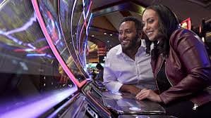 Filipino sports bettor using okay bet app mobile sportsbook on a smartphone
